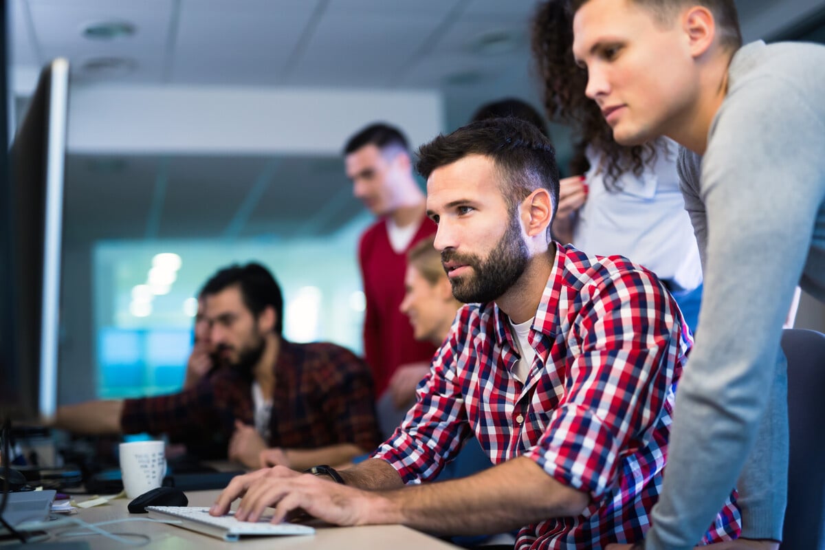Nearshore DevOps team collaborating on continuous integration