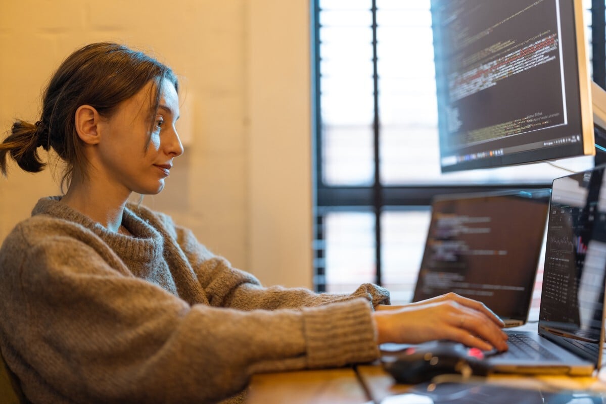 Nearshore software engineers working together in a modern technology environment-1